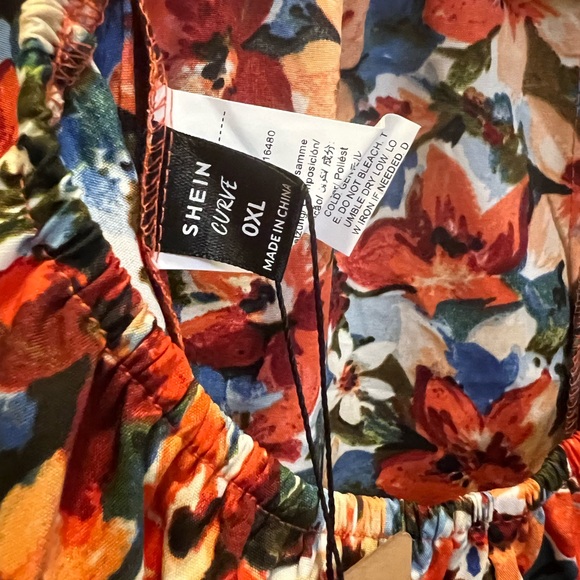 Floral Ruffle Romper with Open Back - Picture 4 of 4